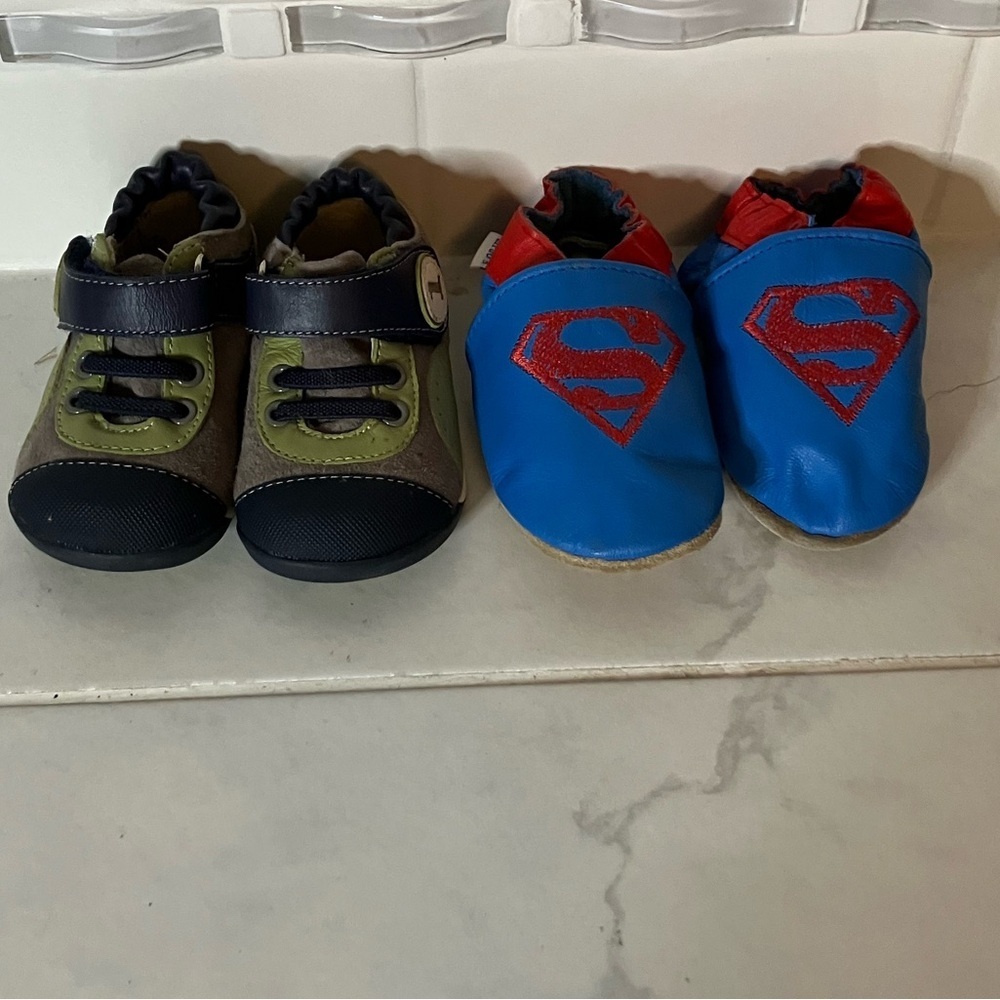 Robeez green, light brown, dark blue shoes with Superman Lill Jo’s slippers